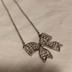 Pretty rhinestone bow silver tone necklace